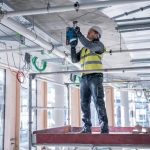 Bosch Professional 18V System Cordless Hammer Drill GBH 18V-22 (SDS plus, KickBack & Vibration Control, incl. GDE 18V-12, L-BOXX, Body Only)